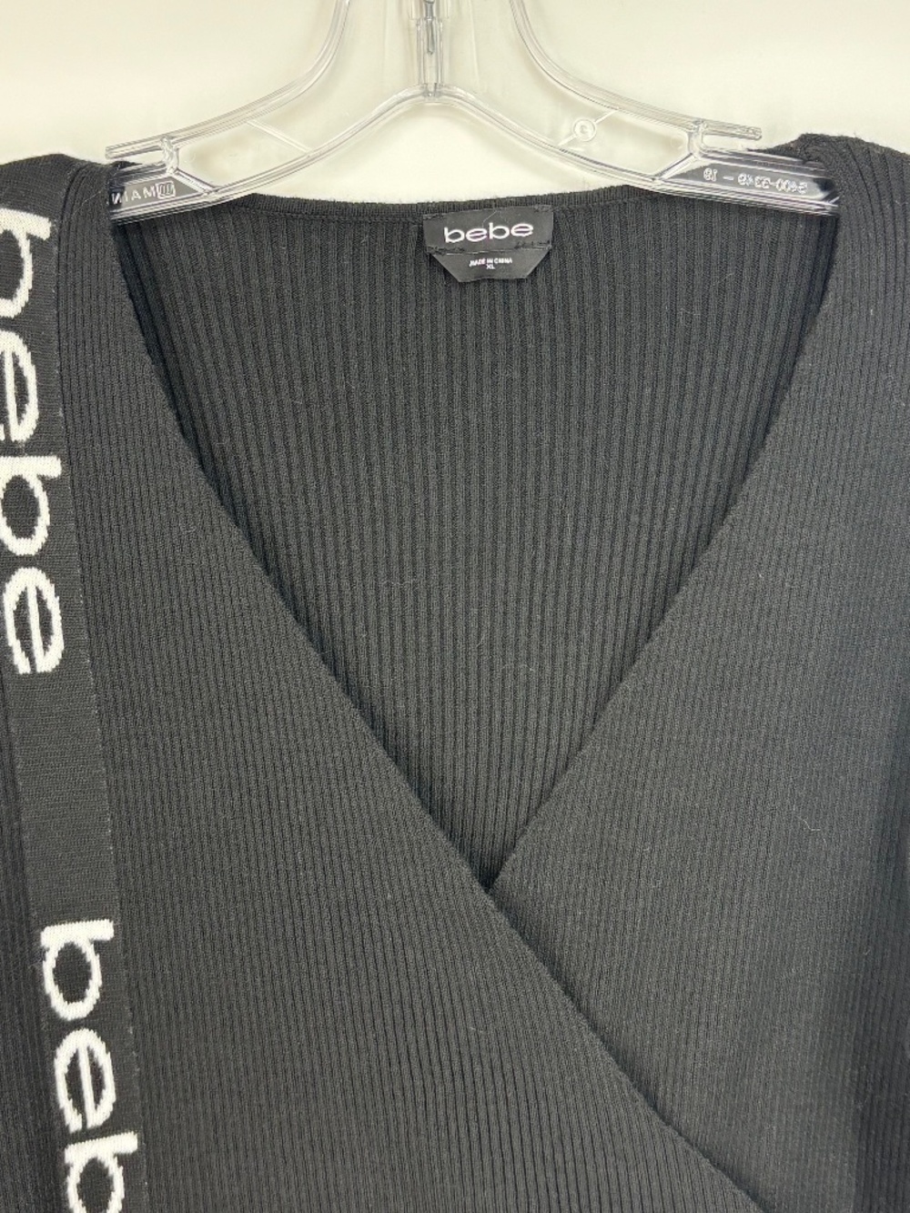 BEBE Womens XL Asymmetric Ribbed Knit Sweater Black Side LOGO Surplice Faux Wrap - Picture 2 of 8